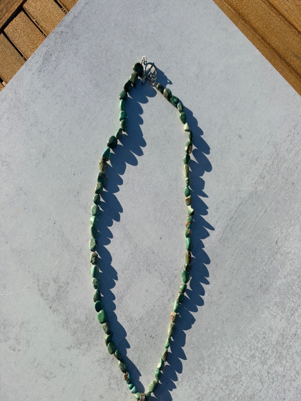 Jennifer Ponson Jewelry - Turquoise carved bone carved horse pendant necklace